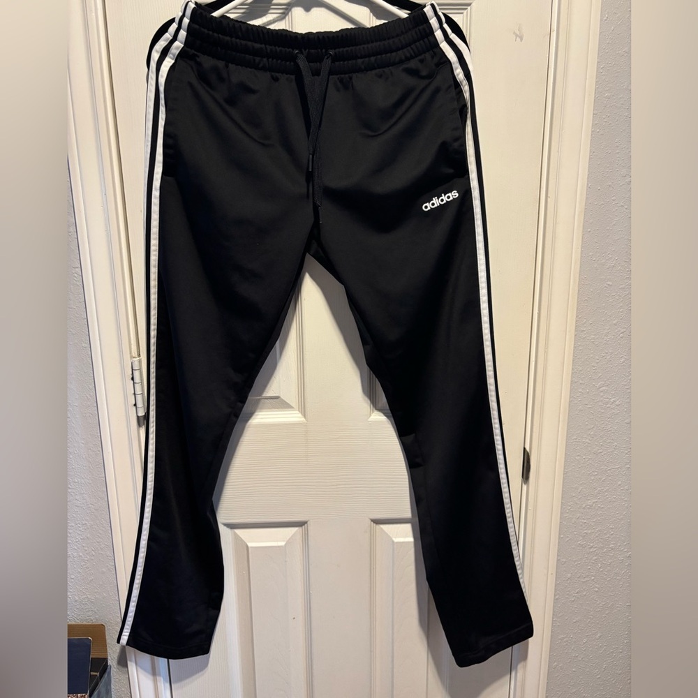 Two Adidas workout women’s pants